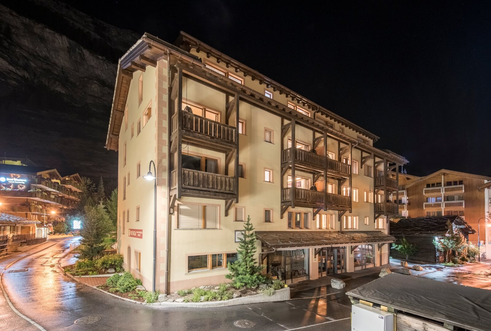 Mount Whitney Apartment building in central Zermatt illuminated at night